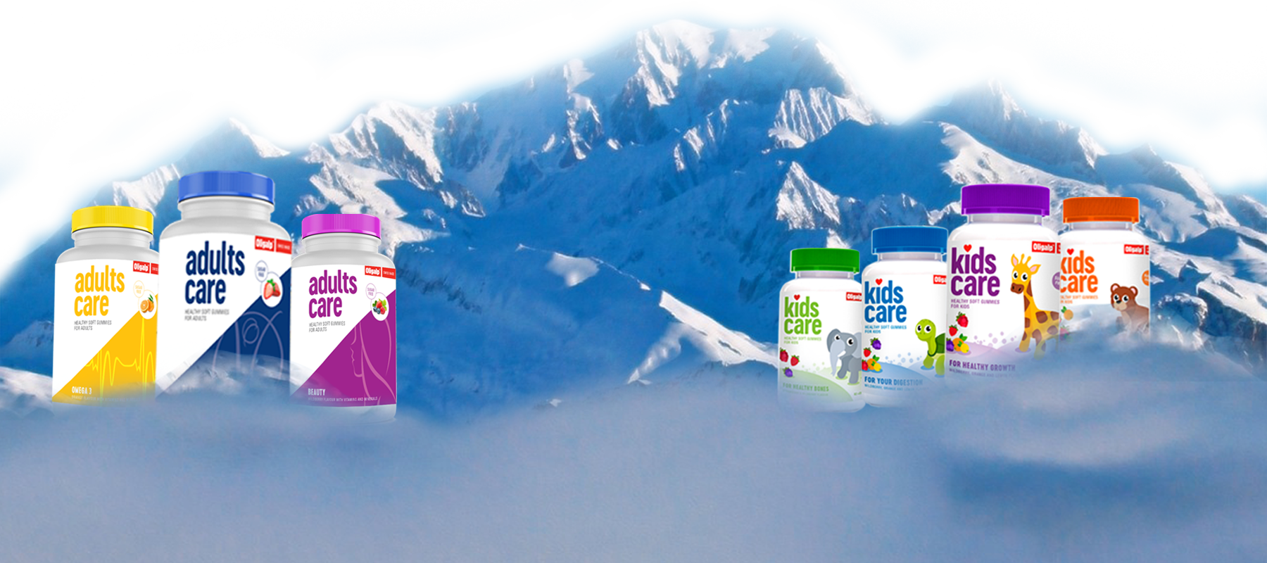 Oligalp Adults Care and Kids Care gummy vitamin bottles arranged against a snowy alpine mountain range